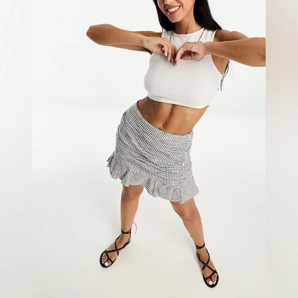 Abercrombie & Fitch ruched mini skirt in black and white check